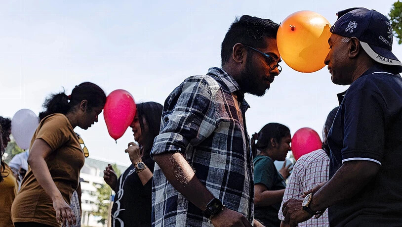 Farbenfroh: Der Ballum-Balltanz mit Luftballons hat in Sri Lanka Tradition.
